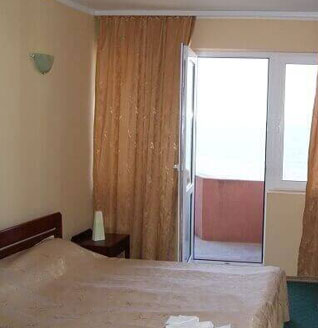 Bedroom with balcony access