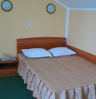 Mansard bedroom with sea view window